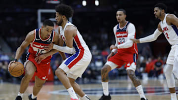 Nov 17, 2024; Washington, District of Columbia, USA; Washington Wizards guard Malcolm Brogdon (15) drives to the basket as Detroit Pistons guard Cade Cunningham (2) defends in the second half at Capital One Arena. Mandatory Credit: Geoff Burke-Imagn Images