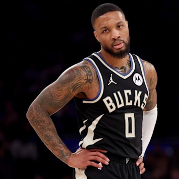 Jan 12, 2025; New York, New York, USA; Milwaukee Bucks guard Damian Lillard (0) reacts during the first quarter against the New York Knicks at Madison Square Garden. Mandatory Credit: Brad Penner-Imagn Images