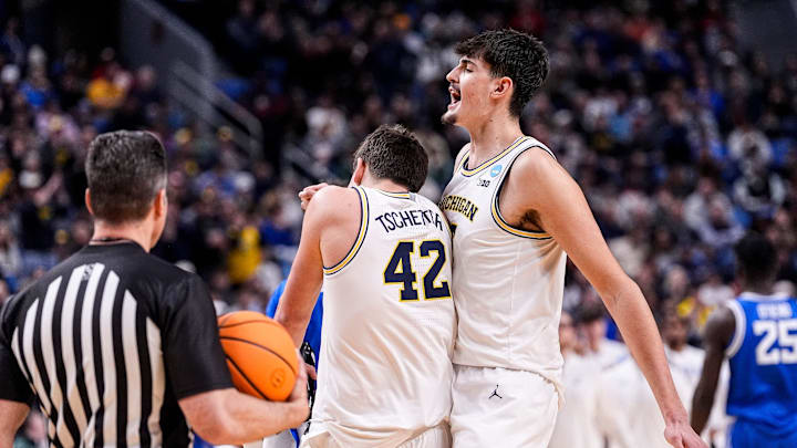 Michigan center Aday Mara (15) and forward Will Tschetter (42) celebrate a play against Saint Louis during the second half of NCAA Tournament Second Round at KeyBank Center in Buffalo on Saturday, March 21, 2026.