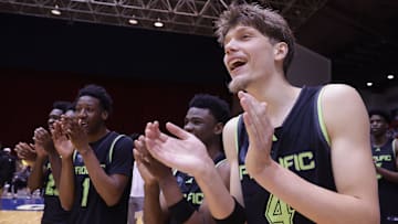 Four-star big Nikola Bundalo, who had a Syracuse basketball offer, de-commits from Washington and reopens his recruitment.