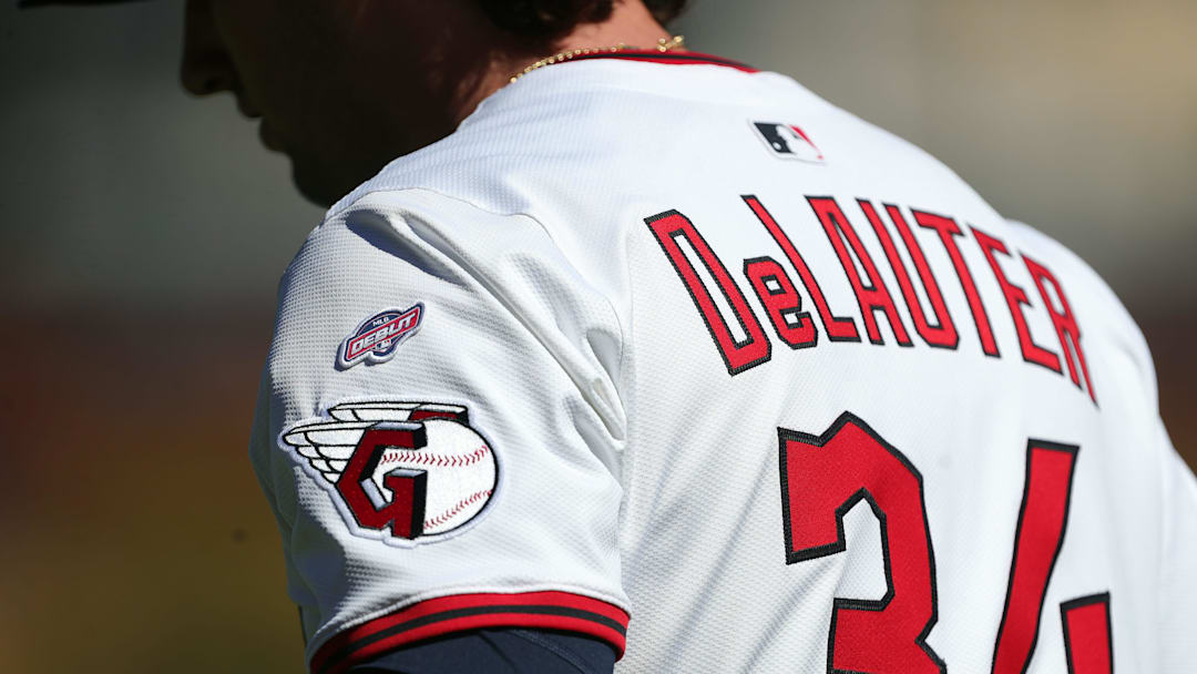 Cleveland Guardians center fielder Chase DeLauter’s MLB debut patch is seen on his shoulder as he warms up before Game 2 of the American League wild card series at Progressive Field, Oct. 1, 2025, in Cleveland, Ohio.