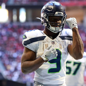 Oct 20, 2024; Atlanta, Georgia, USA; Seattle Seahawks running back Kenneth Walker III (9) celebrates after a touchdown catch against the Atlanta Falcons in the third quarter at Mercedes-Benz Stadium. Mandatory Credit: Brett Davis-Imagn Images