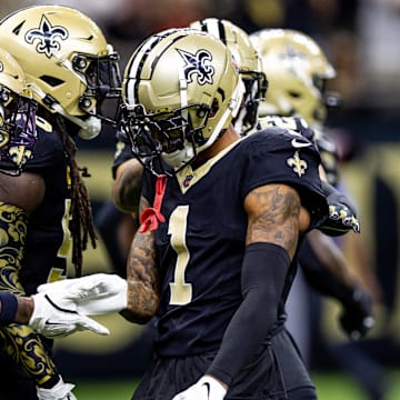 Sep 8, 2024; New Orleans, Louisiana, USA;  New Orleans Saints cornerback Alontae Taylor (1) celebrates a sack against Carolina Panthers quarterback Bryce Young (9) during the first half at Caesars Superdome. Mandatory Credit: Stephen Lew-Imagn Images