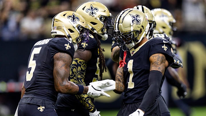 Sep 8, 2024; New Orleans, Louisiana, USA;  New Orleans Saints cornerback Alontae Taylor (1) celebrates a sack against Carolina Panthers quarterback Bryce Young (9) during the first half at Caesars Superdome. Mandatory Credit: Stephen Lew-Imagn Images