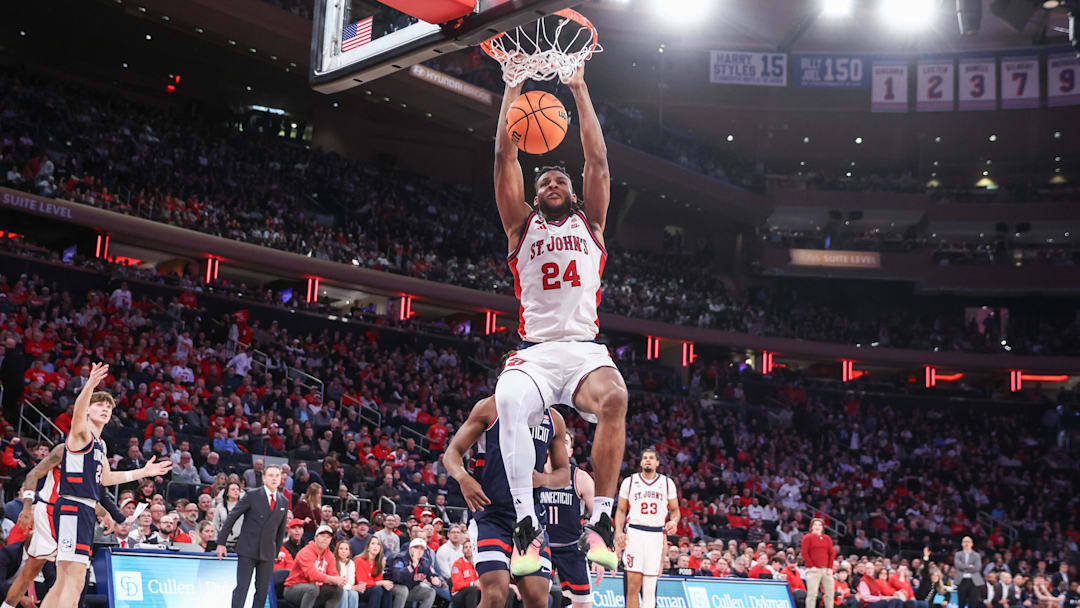 Feb 6, 2026; New York, New York, USA; St. John's Red Storm forward Zuby Ejiofor (24) dunks in the second half against the UConn Huskies at Madison Square Garden.