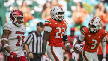 Nov 18, 2023; Miami Gardens, Florida, USA; Miami Hurricanes running back Mark Fletcher Jr. (22) looks on after scoring a touchdown against the Louisville Cardinals during the third quarter at Hard Rock Stadium. Mandatory Credit: Sam Navarro-Imagn Images