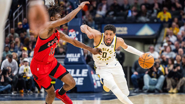 Tyrese Haliburton dribbles the ball