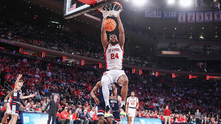 Feb 6, 2026; New York, New York, USA;  St. John's basketball forward Zuby Ejiofor (24) dunks in the second half against the UConn Huskies at Madison Square Garden.