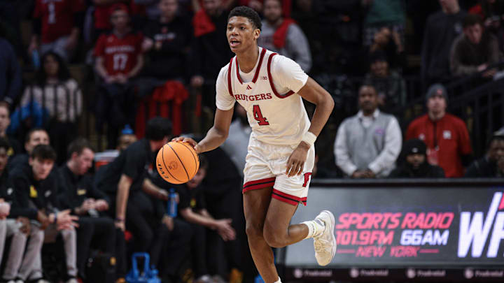 Feb 12, 2025; Piscataway, New Jersey, USA; Rutgers Scarlet Knights guard Ace Bailey (4) dribbles up court during the second half against the Iowa Hawkeyes at Jersey Mike's Arena. Mandatory Credit: Vincent Carchietta-Imagn Images
