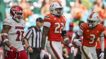 Nov 18, 2023; Miami Gardens, Florida, USA; Miami Hurricanes running back Mark Fletcher Jr. (22) looks on after scoring a touchdown against the Louisville Cardinals during the third quarter at Hard Rock Stadium. Mandatory Credit: Sam Navarro-USA TODAY Sports