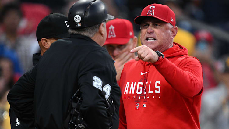 Jul 5, 2023; San Diego, California, USA; Los Angeles Angels manager Phil Nevin (right) argues with