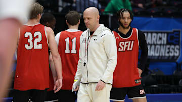 Mar 17, 2025; Dayton, OH, USA; St. Francis (Pa) Red Flash head coach Rob Krimmel coaches during the  First Four Practice at UD Arena. Mandatory Credit: Rick Osentoski-Imagn Images