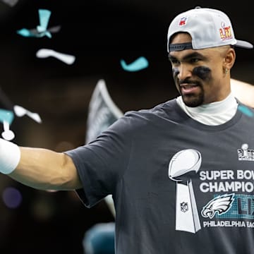 Feb 9, 2025; New Orleans, LA, USA; Philadelphia Eagles quarterback Jalen Hurts (1) celebrates after defeating the Kansas City Chiefs during Super Bowl LIX at Ceasars Superdome. Mandatory Credit: Mark J. Rebilas-Imagn Images