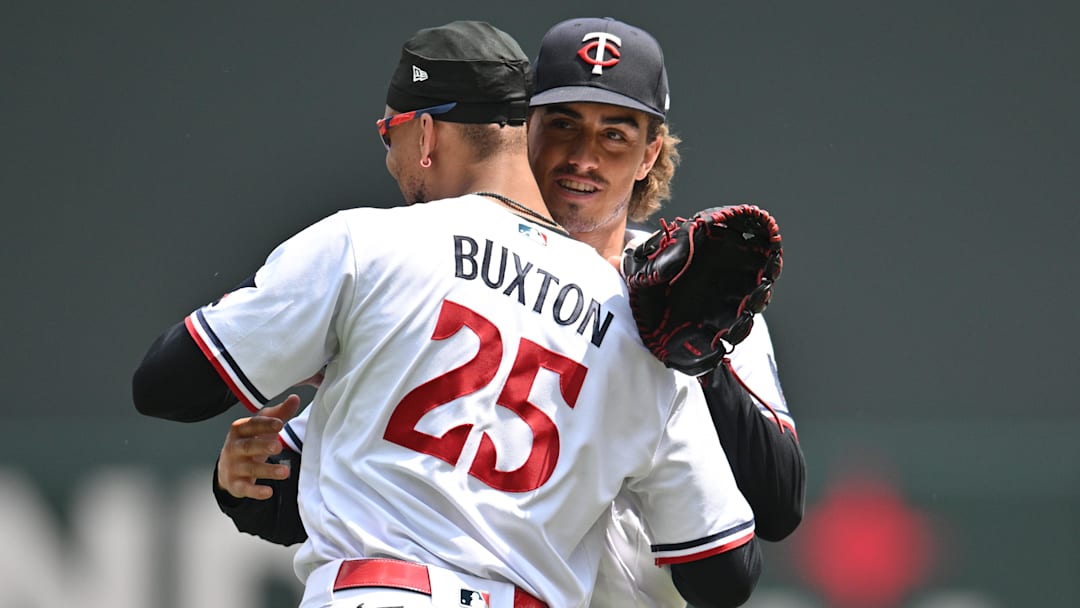 Jun 22, 2023; Minneapolis, Minnesota, USA; Minnesota Twins starting pitcher Joe Ryan (41) and designated hitter Byron Buxton (25) react after the game against the Boston Red Sox at Target Field. Mandatory Credit: Jeffrey Becker-Imagn Images