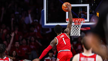 Feb 22, 2025; Tucson, Arizona, USA; Arizona Wildcats guard Caleb Love (1) dunks the ball with one hand during the first half against the BYU Cougars at McKale Center. Mandatory Credit: Aryanna Frank-Imagn Images