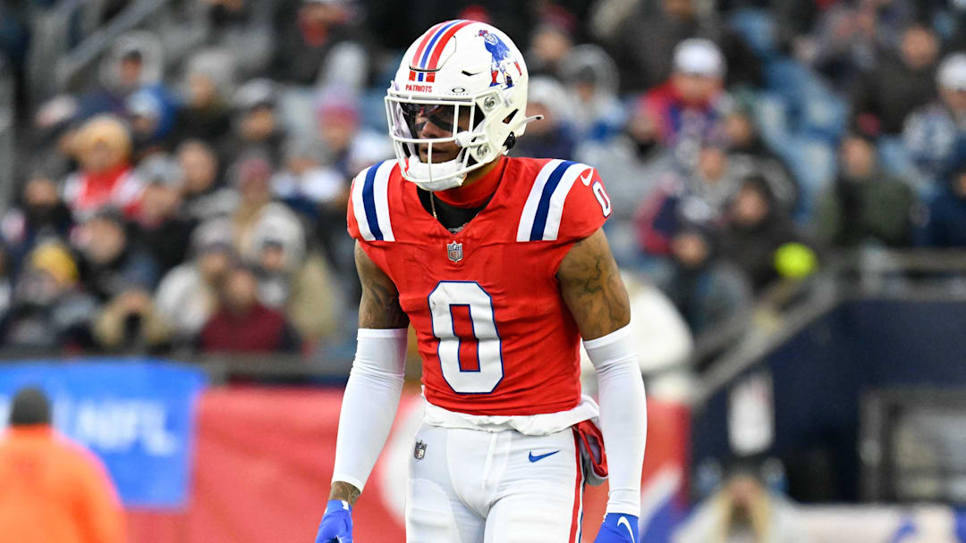 Dec 1, 2024; Foxborough, Massachusetts, USA; New England Patriots cornerback Christian Gonzalez (0) lines up during the second half against the Indianapolis Colts at Gillette Stadium. Mandatory Credit: Eric Canha-Imagn Images