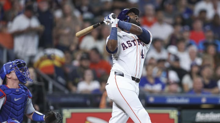 Jul 27, 2024; Houston, Texas, USA; Houston Astros designated hitter Yordan Alvarez (44) reacts after hitting a fly ball during the first inning against the Los Angeles Dodgers at Minute Maid Park.