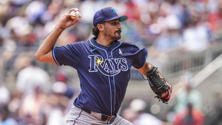 Jun 16, 2024; Cumberland, Georgia, USA; Tampa Bay Rays starting pitcher Zach Eflin (24) pitches against the Atlanta Braves at Truist Park. Mandatory Credit: Dale Zanine-USA TODAY Sports