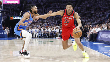 Apr 24, 2024; Oklahoma City, Oklahoma, USA; New Orleans Pelicans guard Trey Murphy III (25) drives around Oklahoma City Thunder guard Isaiah Joe (11) during the second quarter of game two of the first round for the 2024 NBA playoffs at Paycom Center.