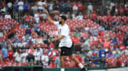 Boston Celtics forward Jayson Tatum throws out a ceremonial first pitch prior to a game between the St. Louis Cardinals and the Chicago Cubs at Busch Stadium. 