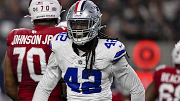 Dallas Cowboys defensive end Jadeveon Clowney celebrates after he sacks Arizona Cardinals quarterback Jacoby Brissett.