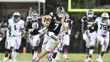 Oct 6, 2018; Starkville, MS, USA; Mississippi State Bulldogs quarterback Nick Fitzgerald (7) runs the ball against the Auburn Tigers during the fourth quarter  at Davis Wade Stadium. Mandatory Credit: Matt Bush-USA TODAY Sports