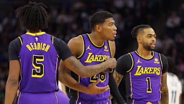 Dec 30, 2023; Minneapolis, Minnesota, USA; Los Angeles Lakers forward Rui Hachimura (28) reacts to his technical foul as he stands between forward Cam Reddish (5) and guard D'Angelo Russell (1) in the first quarter of the game with the Minnesota Timberwolves at Target Center. Mandatory Credit: Bruce Kluckhohn-Imagn Images