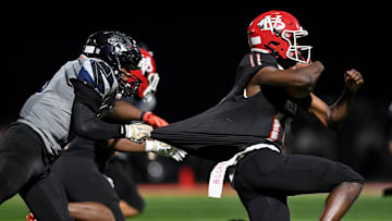 Vero Beach's Efrem White (11) runs during a playoff game against Lake Nona on Nov. 21, 2025.  The senior completed 13 of 19 passes for 159 yards and one touchdown and rushed 10 times for 74 yards and four scores to lead the Indians to a 49-23 victory against Dr. Phillips in the Class 7A, Region 3 final on Friday, Nov. 28, 2025.