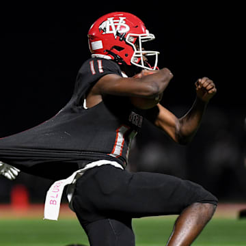 Vero Beach's Efrem White (11) runs during a playoff game against Lake Nona on Nov. 21, 2025.  The senior completed 13 of 19 passes for 159 yards and one touchdown and rushed 10 times for 74 yards and four scores to lead the Indians to a 49-23 victory against Dr. Phillips in the Class 7A, Region 3 final on Friday, Nov. 28, 2025.