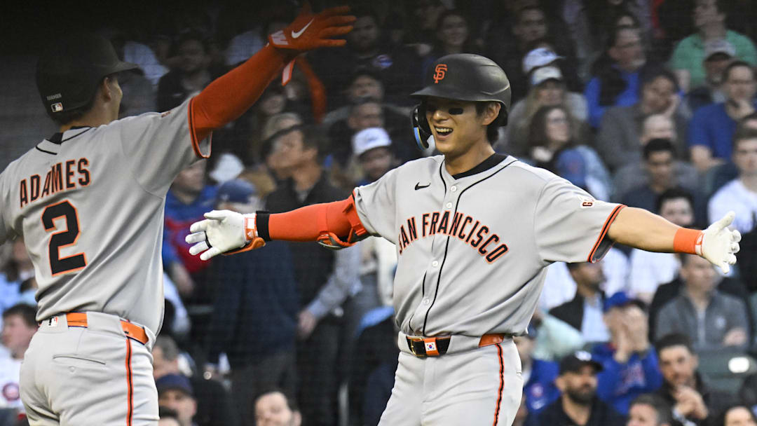 May 6, 2025; Chicago, Illinois, USA;  San Francisco Giants outfielder Jung Hoo Lee (51) celebrates with San Francisco Giants shortstop Willy Adames (2)  after they score on Lee’s two run home run against the Chicago Cubs during the third inning at Wrigley Field. Mandatory Credit: Matt Marton-Imagn Images