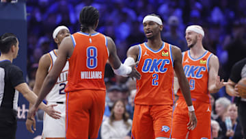 Nov 28, 2025; Oklahoma City, Oklahoma, USA; Oklahoma City Thunder guard Shai Gilgeous-Alexander (2) and guard Jalen Williams (8) high five after a play against the Phoenix Suns during the second quarter at Paycom Center. Mandatory Credit: Alonzo Adams-Imagn Images