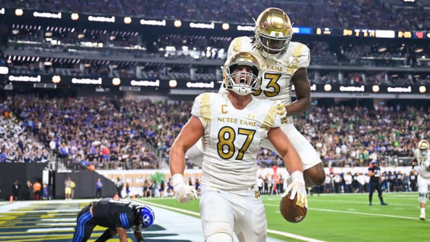 Tight end Michael Mayer celebrates a Notre Dame touchdown in the 2022 Shamrock Series win over BYU.