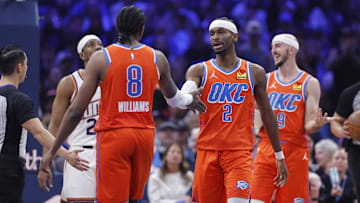 Nov 28, 2025; Oklahoma City, Oklahoma, USA; Oklahoma City Thunder guard Shai Gilgeous-Alexander (2) and guard Jalen Williams (8) high five after a play against the Phoenix Suns during the second quarter at Paycom Center. Mandatory Credit: Alonzo Adams-Imagn Images