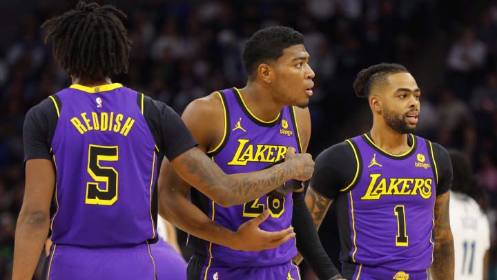 Dec 30, 2023; Minneapolis, Minnesota, USA; Los Angeles Lakers forward Rui Hachimura (28) communicates with colleagues Cam Reddish (5) and D'Angelo Russell (1).