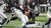 Dec 7, 2025; Atlanta, Georgia, USA; Seattle Seahawks safety Nick Emmanwori (3) upends Atlanta Falcons running back Tyler Allgeier (25) during the first half at Mercedes-Benz Stadium. Mandatory Credit: Dale Zanine-Imagn Images