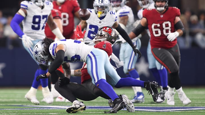 Tampa Bay Buccaneers tight end Payne Durham drops the ball after being hit by Dallas Cowboys linebacker Marist Liufau. Tampa Bay Buccaneers tight end Payne Durham drops the ball after being hit by Dallas Cowboys linebacker Marist Liufau.