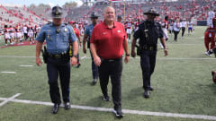 Razorbacks head coach Sam Pittman walks off the field at War Memorial Stadium. 