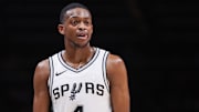 Feb 5, 2025; Atlanta, Georgia, USA; San Antonio Spurs guard De'Aaron Fox (4) in action against the Atlanta Hawks in the third quarter at State Farm Arena. 