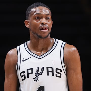 Feb 5, 2025; Atlanta, Georgia, USA; San Antonio Spurs guard De'Aaron Fox (4) in action against the Atlanta Hawks in the third quarter at State Farm Arena. 