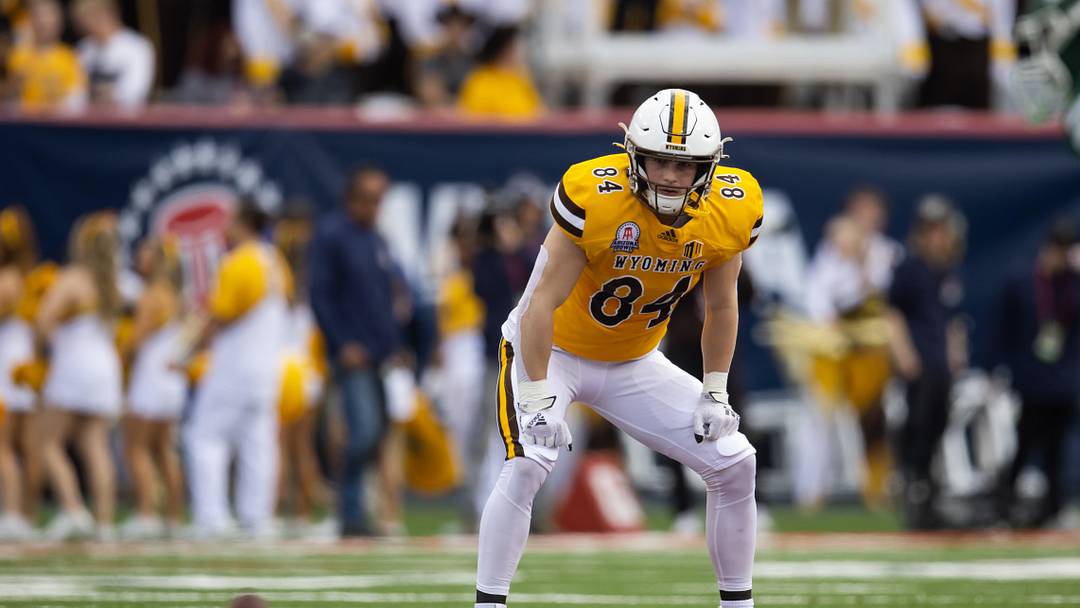 Dec 30, 2022; Tucson, AZ, USA; Wyoming Cowboys tight end John Michael Gyllenborg (84) against the Ohio Bobcats during the 2022 Barstool Sports Arizona Bowl at Arizona Stadium. Mandatory Credit: Mark J. Rebilas-Imagn Images