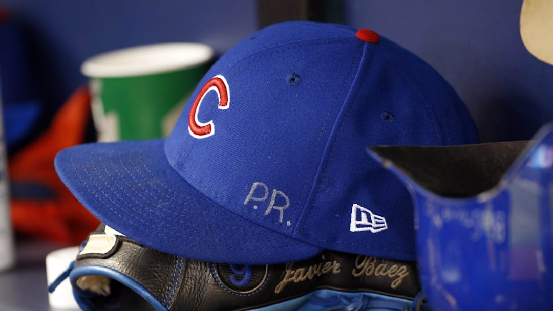 Sep 20, 2017; St. Petersburg, FL, USA; A detailed view of Chicago Cubs third baseman Javier Baez (9) (not pictured) hat and glove with the initials P.R. for his home country Puerto Rico against the Tampa Bay Rays at Tropicana Field. Mandatory Credit: Kim Klement-Imagn Images