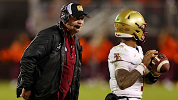 Oct 17, 2024; Blacksburg, Virginia, USA; Boston College Eagles head coach Bill O'Brien talks to quarterback Thomas Castellanos (1) during a time out against the Virginia Tech Hokies at Lane Stadium. Mandatory Credit: Peter Casey-Imagn Images