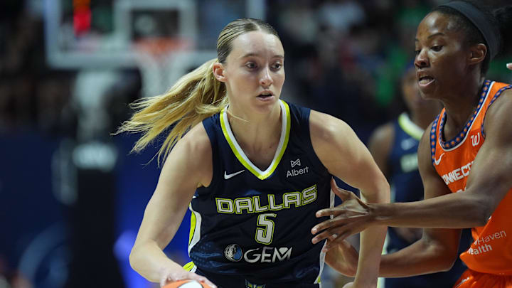 Jun 20, 2025; Uncasville, Connecticut, USA; Dallas Wings guard Paige Bueckers (5) drives the ball against Connecticut Sun guard Lindsay Allen (15) in the first half at Mohegan Sun Arena. Mandatory Credit: David Butler II-Imagn Images Jun 20, 2025; Uncasville, Connecticut, USA; Dallas Wings guard Paige Bueckers (5) drives the ball against Connecticut Sun guard Lindsay Allen (15) in the first half at Mohegan Sun Arena. Mandatory Credit: David Butler II-Imagn Images