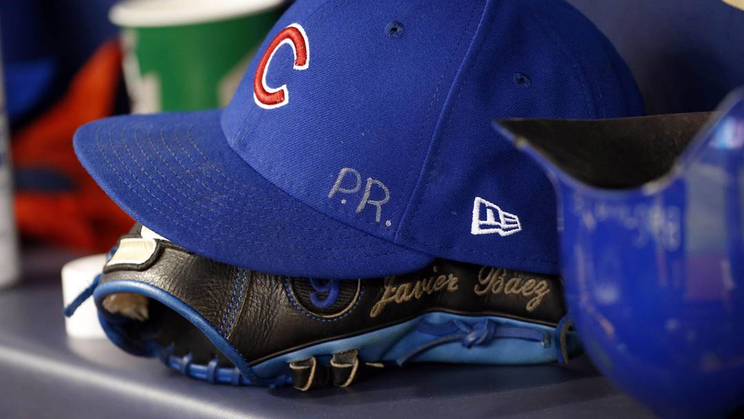 Sep 20, 2017; St. Petersburg, FL, USA; A detailed view of Chicago Cubs third baseman Javier Baez (9) (not pictured) hat and glove with the initials P.R. for his home country Puerto Rico against the Tampa Bay Rays at Tropicana Field. Sep 20, 2017; St. Petersburg, FL, USA; A detailed view of Chicago Cubs third baseman Javier Baez (9) (not pictured) hat and glove with the initials P.R. for his home country Puerto Rico against the Tampa Bay Rays at Tropicana Field.