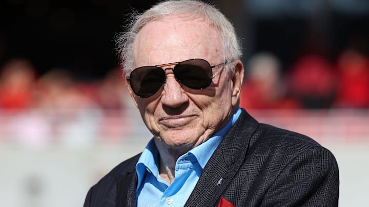 Dallas Cowboys owner and member of the 1964 Arkansas Razorbacks National Championship team, Jerry Jones, looks on as the team is honored during the first half against the Texas Longhorns. Dallas Cowboys owner and member of the 1964 Arkansas Razorbacks National Championship team, Jerry Jones, looks on as the team is honored during the first half against the Texas Longhorns.