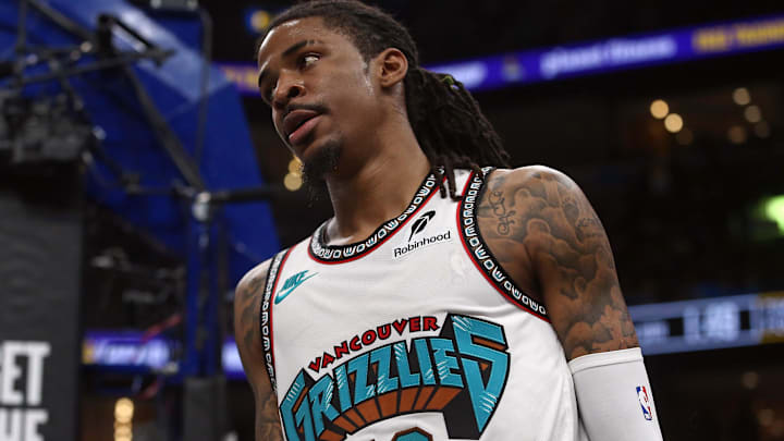 Morant reacts during a Grizzlies game against the Mavericks.