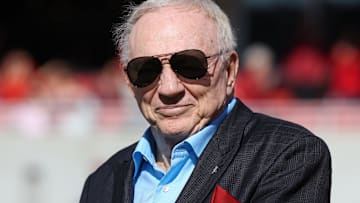 Nov 16, 2024; Fayetteville, Arkansas, USA; Dallas Cowboys owner and member of the 1964 Arkansas Razorbacks National Championship team, Jerry Jones, looks on as the team is honored during the first half against the Texas Longhorns at Donald W. Reynolds Razorback Stadium. Mandatory Credit: Nelson Chenault-Imagn Images