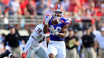 Florida Gators wide receiver Kahleil Jackson (22) hauls in a reception against Georgia Bulldogs defensive back Julian Humphrey (12) during the first quarter of an NCAA Football game Saturday, Oct. 28, 2023 at EverBank Stadium in Jacksonville, Fla. Georgia defeated Florida 43-20. [Corey Perrine/Florida Times-Union]