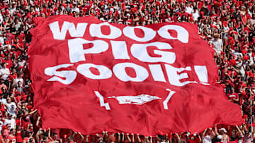 Sep 9, 2023; Fayetteville, Arkansas, USA; Arkansas Razorbacks student section hold a flag up during the first quarter against the Kent State Golden Flashes at Donald W. Reynolds Razorback Stadium. Mandatory Credit: Nelson Chenault-Imagn Images