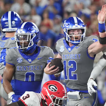 Kentucky’s Brock Vandagriff runs for a first down against Georgia Saturday night.
Sept. 14, 2024